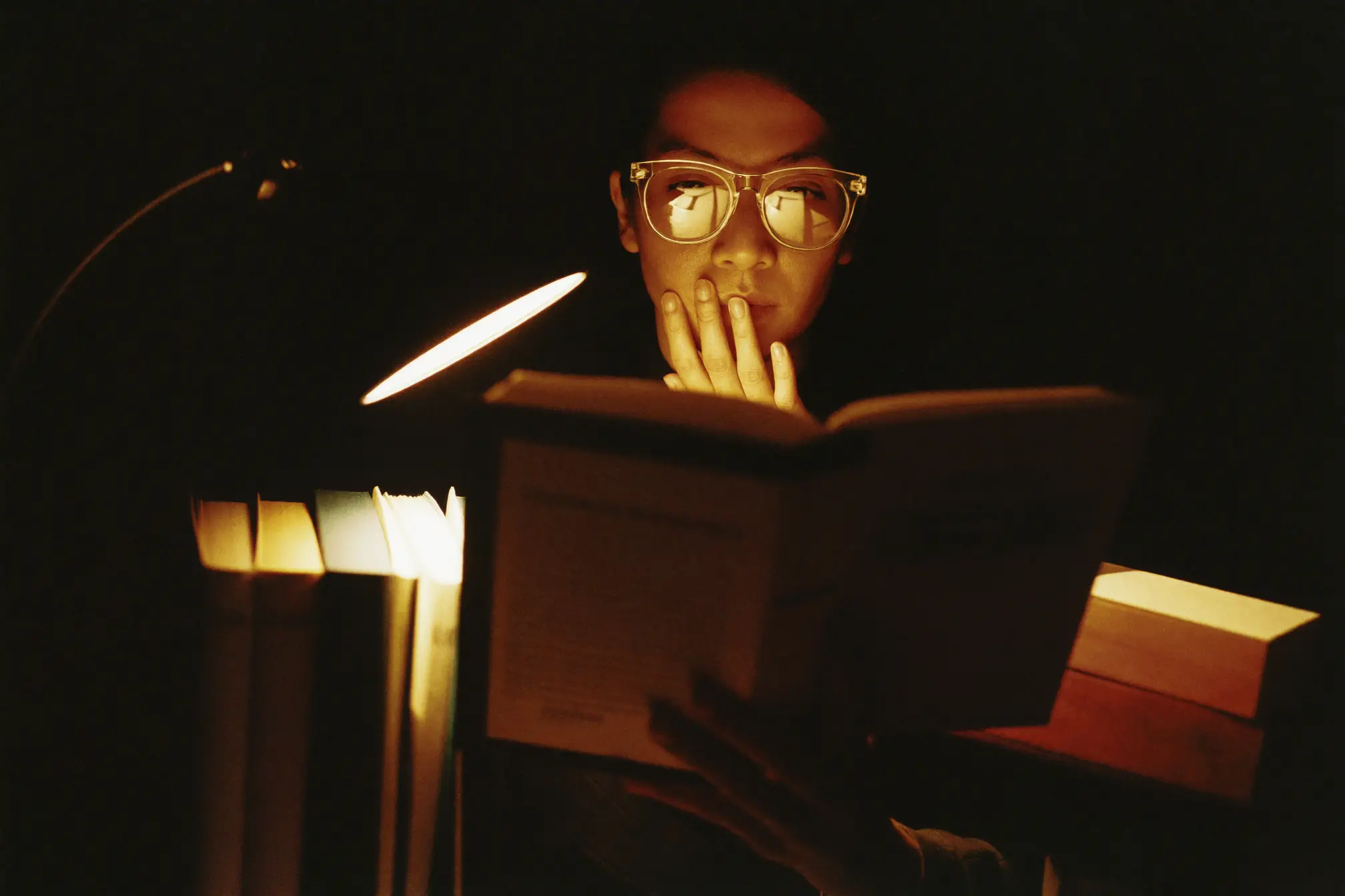 A legal researcher reading one.