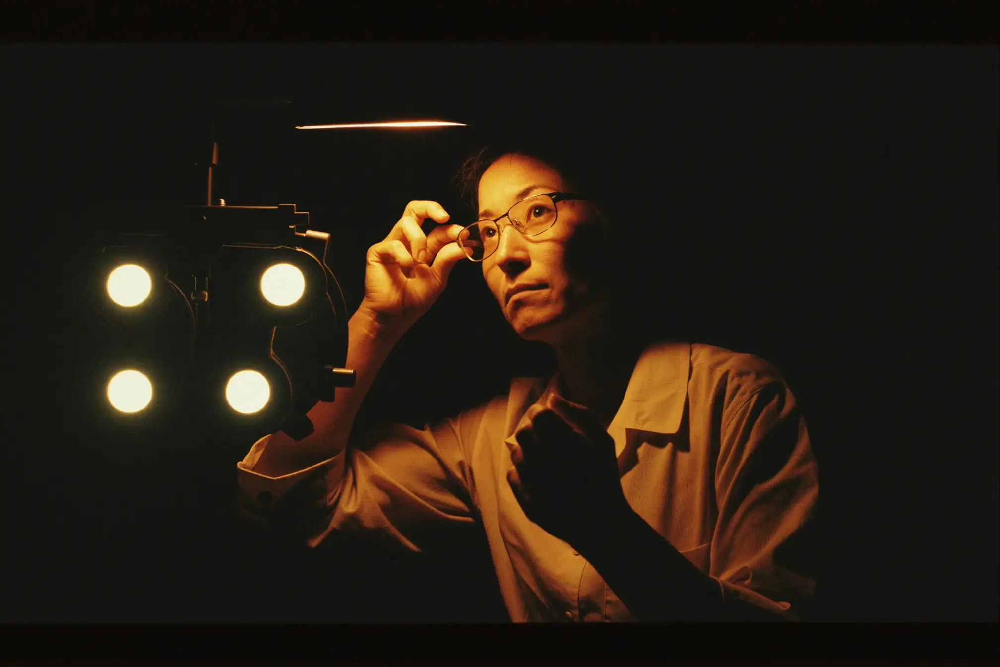 An ophthalmologist at their work.